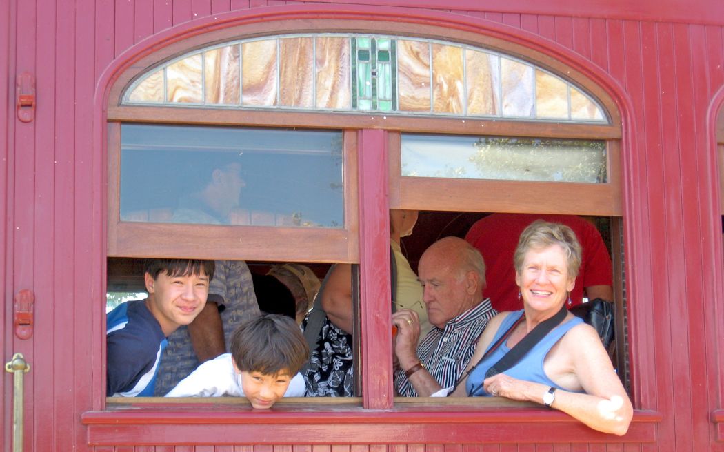 Mom looks out from Train