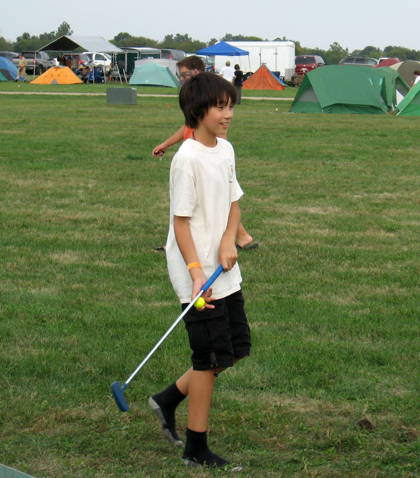 Arthur playing miniature golf