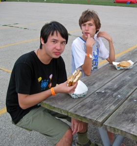 Sebastian and Oliver try an appetizer