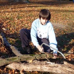 Arthur sawing firewood