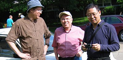 photo of Eric with Chung and David, two social worker friends who went to GWB with Eric and now reside in Chicago