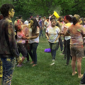 Students at UIS celebrating Holi during Asian Celebration Week in late April on the UIS campus