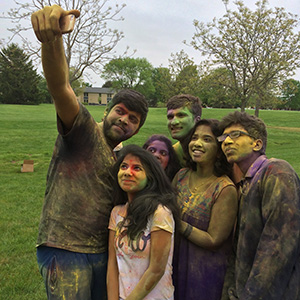Students at UIS taking a self-portrait at the Holi event during Asian Celebration Week in late April on the UIS campus
