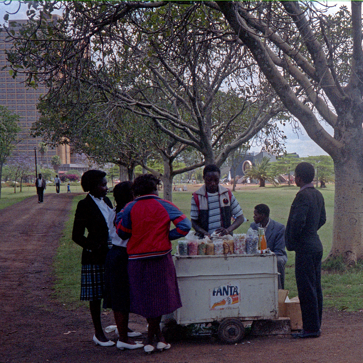 A pushcart operator with Fanta drinks