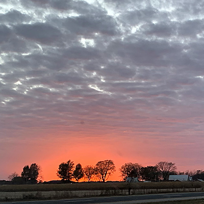 Sunset driving west on I-64 in central Illinois