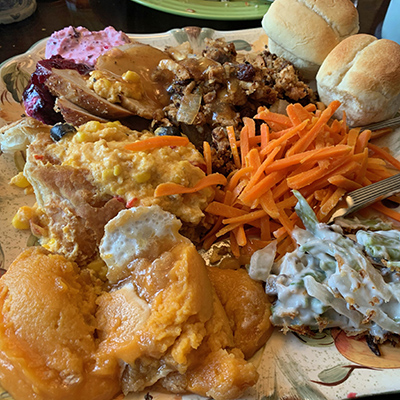 A plate covered with food, a vegetarian Thanksgiving meal