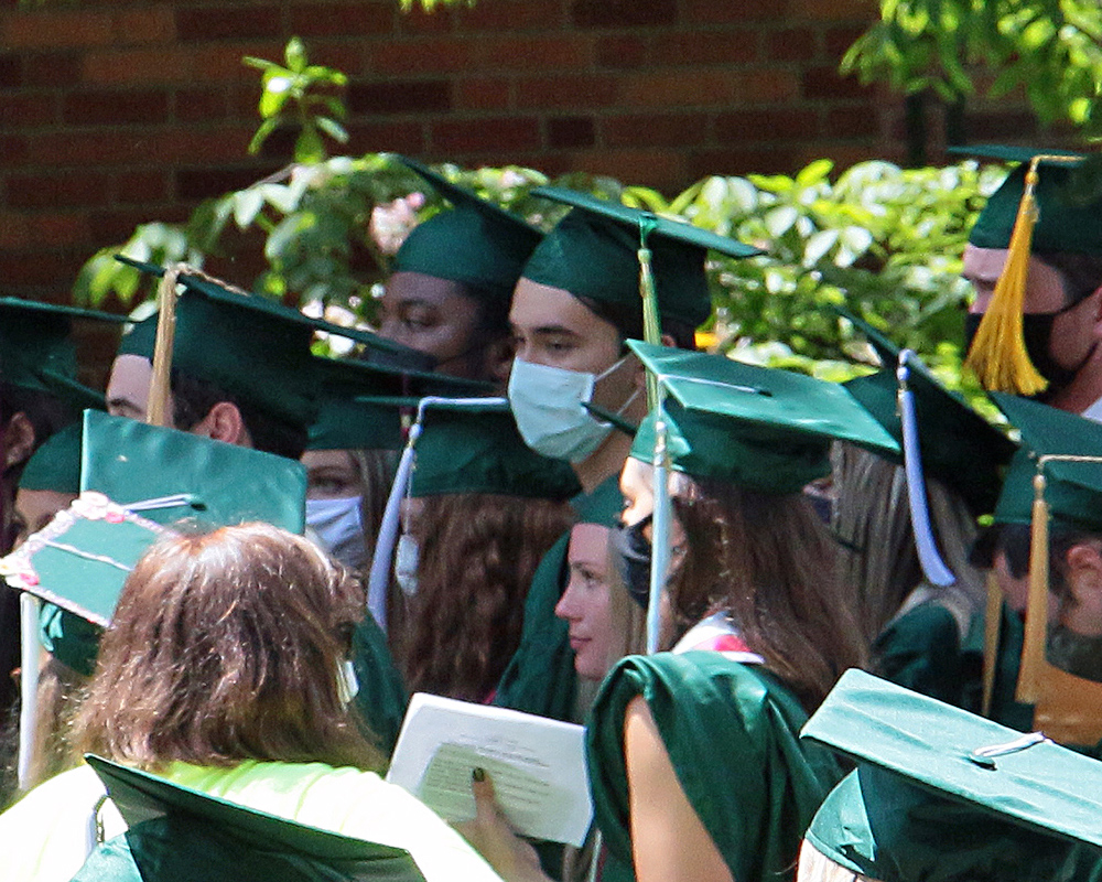 Graduates of the University of Oregon participating in events on graduation day, 2021