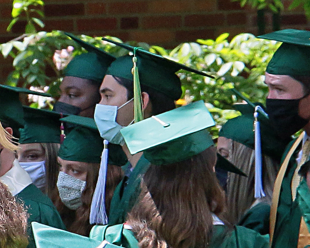 Graduates of the University of Oregon participating in events on graduation day, 2021