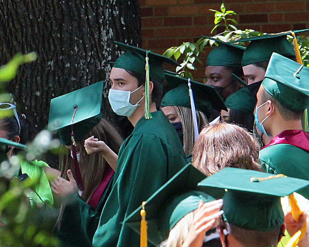 Graduates of the University of Oregon participating in events on graduation day, 2021