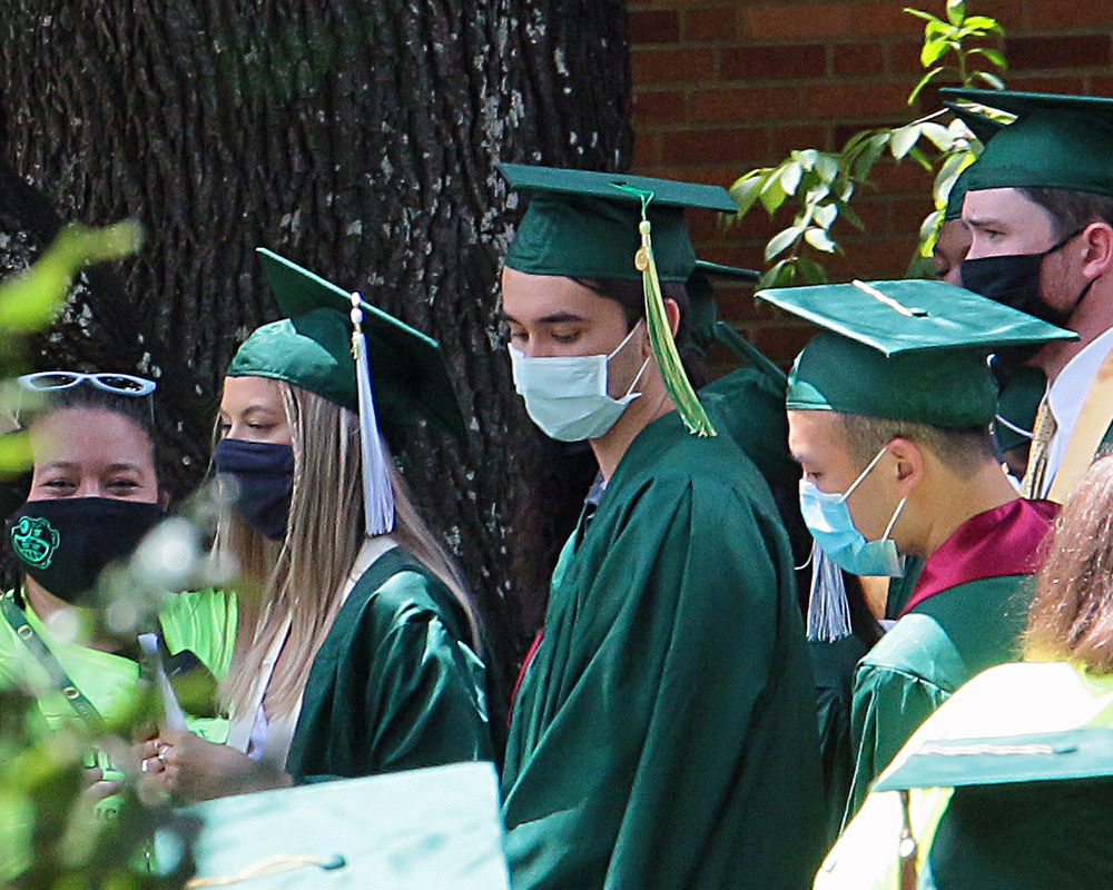 Graduates of the University of Oregon participating in events on graduation day, 2021