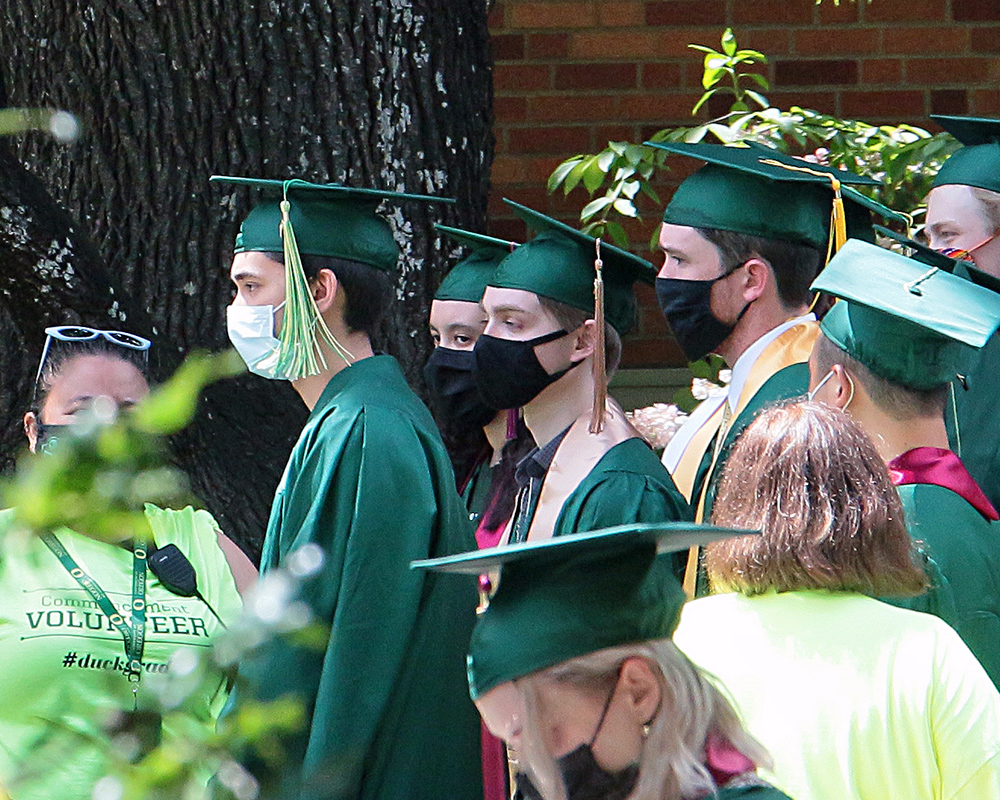 Graduates of the University of Oregon participating in events on graduation day, 2021