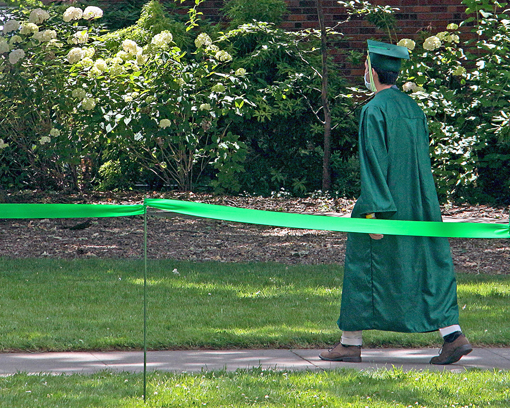 Graduates of the University of Oregon participating in events on graduation day, 2021