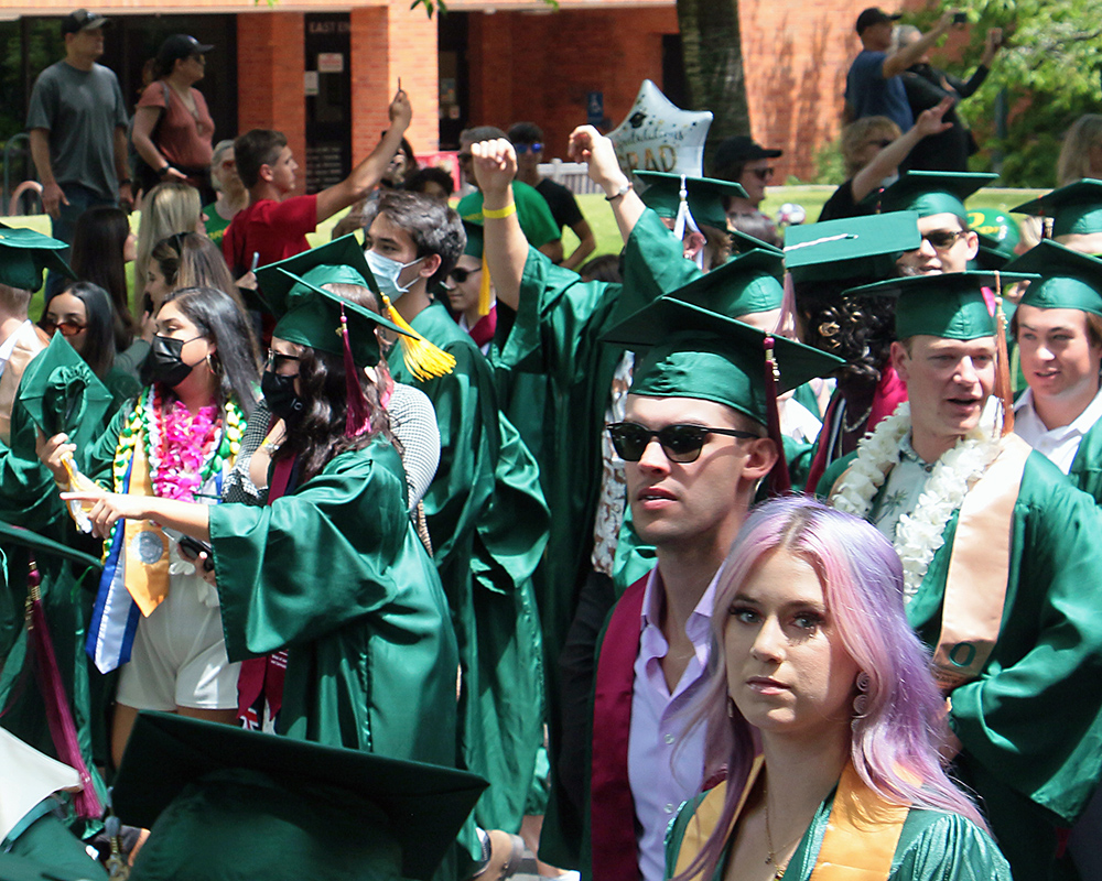 Graduates of the University of Oregon participating in events on graduation day, 2021