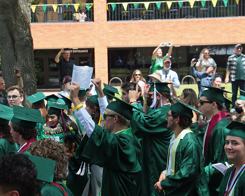 Graduates of the University of Oregon participating in events on graduation day, 2021