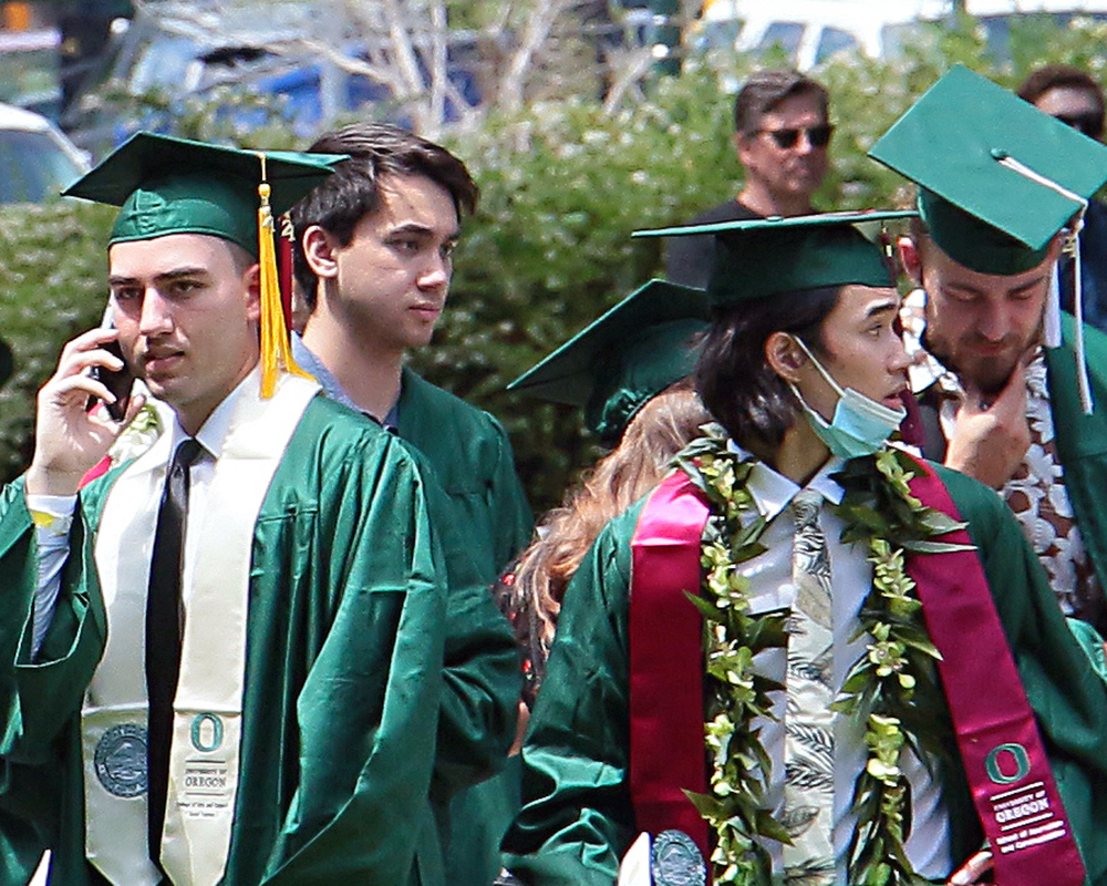 Graduates of the University of Oregon participating in events on graduation day, 2021