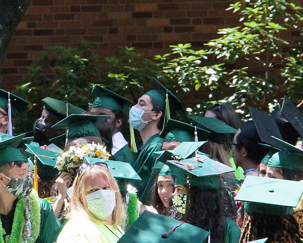 Graduates of the University of Oregon participating in events on graduation day, 2021