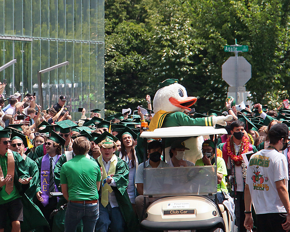 Graduates of the University of Oregon participating in events on graduation day, 2021