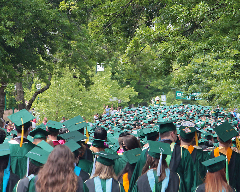 Graduates of the University of Oregon participating in events on graduation day, 2021