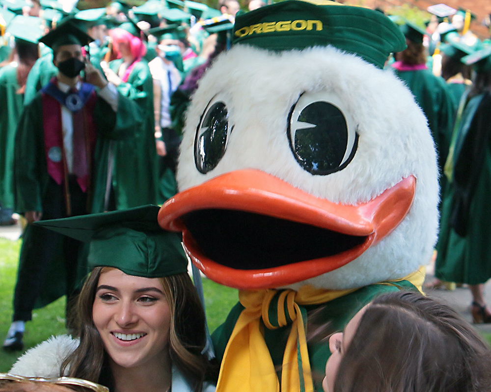 Graduates of the University of Oregon participating in events on graduation day, 2021