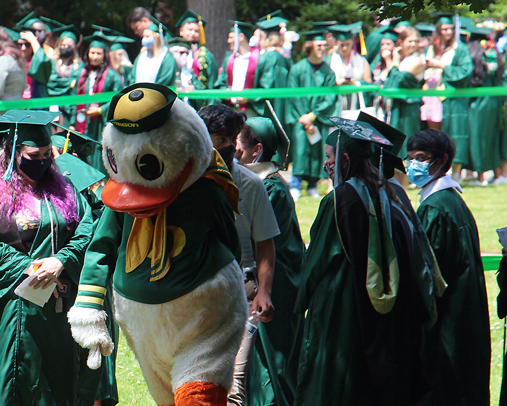 Graduates of the University of Oregon participating in events on graduation day, 2021