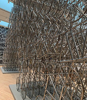 Forever Bicyles, a massive arch seemingly filling the gallery with over 700 bicycles welded together into a structure of bike frames and wheels (without the innertues and tires)