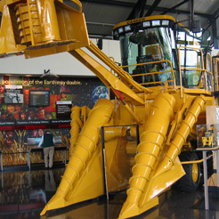 Inside the John Deere Pavilion a boy in a large farm machine