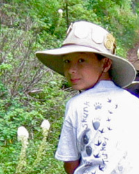 Sebastian riding horse in Glacier National Park in 2005