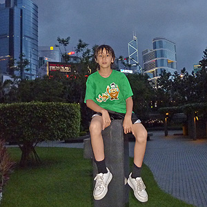 Arthur near Hyatt, with Bank of China Tower over his left shoulder (on his right)