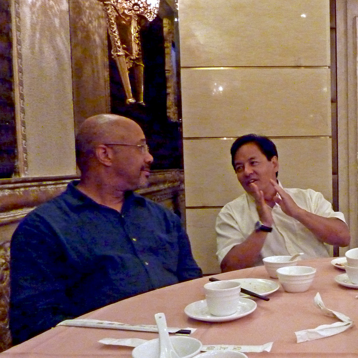 James Herbert Wiliams and Jon Matsuoka in conversation at the table