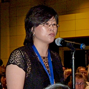 Melody addressing the panel in the fourth plenary session