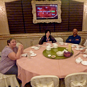 Violet Horvath, Melody Zhang, James Herbert Williams, Jon Matsuoka, waiting for food in Hong Kong