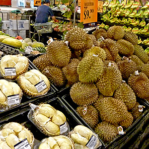 Durians for sale in a grocery store