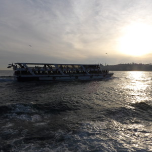 One of the other ferries with the sunset behind it.