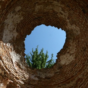 See the sky through a broken ceiling in Kazanlak.