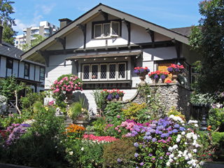 Many flowers and a cute house in Vancouver