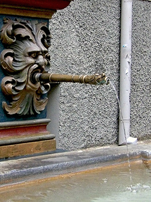 Water in a public fountain in Basel.