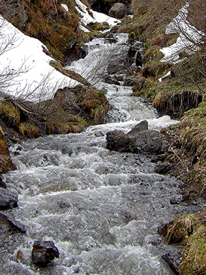 This is a waterfall in Switzerland, fowing down into the valley of the White Lütschine.