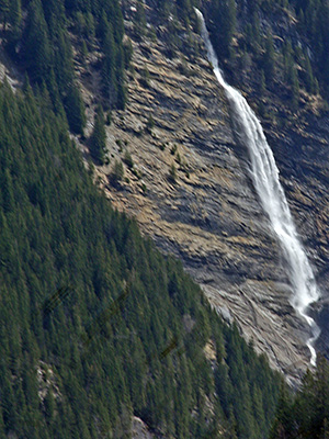 This is a waterfall in Switzerland, fowing down into the valley of the White Lütschine.