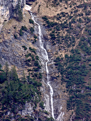 This is a waterfall in Switzerland, fowing down into the valley of the White Lütschine.