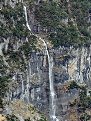 This is a waterfall in Switzerland, fowing down into the valley of the White Lütschine.