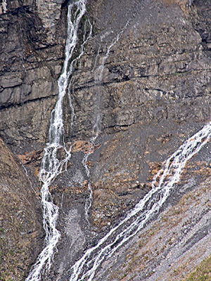 This is a waterfall in Switzerland, fowing down into the valley of the Sefinen Lütschine.