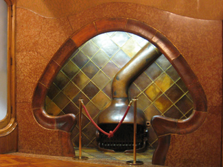 Stove area with entry shaped as a mushroom at Casa Batllo