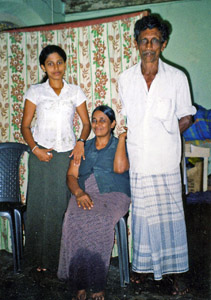 Nadeeka Karunarathna with her parents in Sri Lanka.